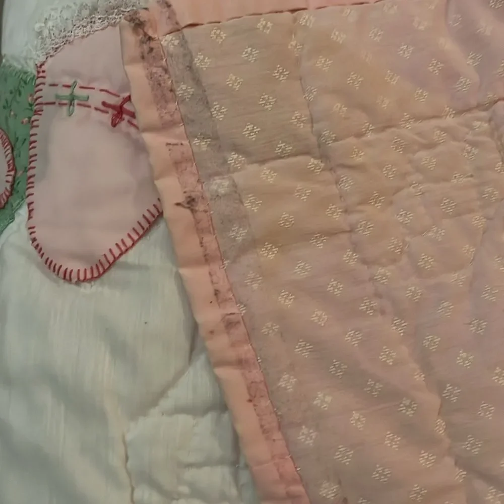 Handmade bonnet doll quilt